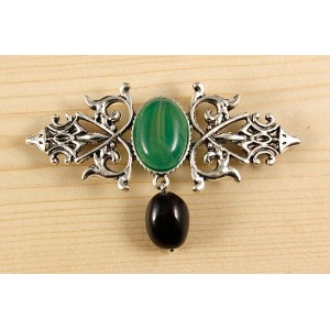 Брошь из агата зеленого (тонир.) "вензель", основа 70х2.4мм, овал 18х13мм, подвеска гранат