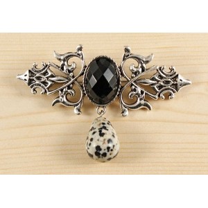 Брошь из агата черного (огранка) "вензель", основа 70х2.4мм, овал 18х13мм, подвеска яшма далматиновая