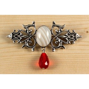 Брошь из агата белого "вензель", основа 70х2.4мм, овал 18х13мм, подвеска красная
