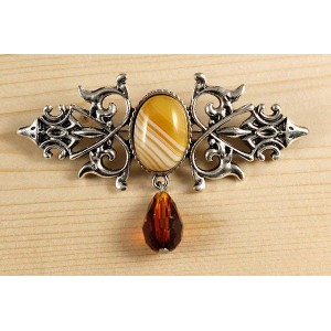 Брошь из агата желтого (тонир.) "вензель", основа 70х2.4мм, овал 18х13мм, подвеска цвет коньячный