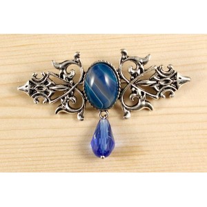Брошь из агата синего (тонир.) "вензель", основа 70х2.4мм, овал 18х13мм, подвеска синяя