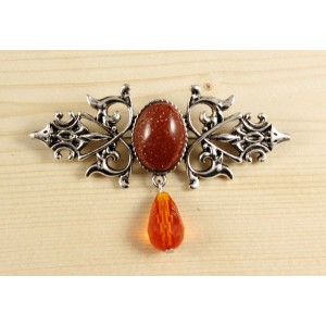 Брошь из авантюрина красного (иск.) "вензель", основа 70х2.4мм, овал 18х13мм, подвеска оранжевая