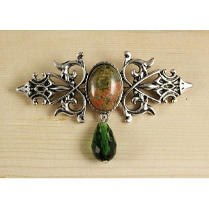 Брошь из унакита "вензель", основа 70х2.4мм, овал 18х13мм, подвеска зеленая
