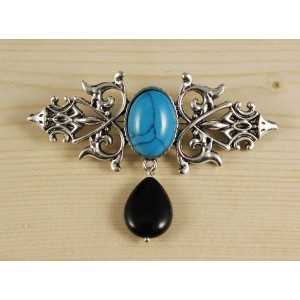 Брошь из бирюзы (имитация) "вензель", основа 70х2.4мм, овал 18х13мм, подвеска агат черный