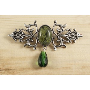 Брошь из змеевика "вензель", основа 70х2.4мм, овал 18х13мм, подвеска зеленая