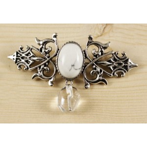 Брошь из каулита (имит. кахолонга) "вензель", основа 70х2.4мм, овал 18х13мм, подвеска горный хрусталь