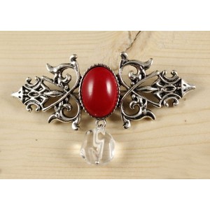 Брошь из коралла красного (иск.) "вензель", основа 70х2.4мм, овал 18х13мм, подвеска горный хрусталь