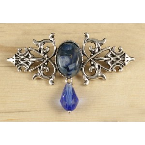 Брошь из кианита (кабошон-мозаика) "вензель", основа 70х2.4мм, овал 18х13мм, подвеска синяя