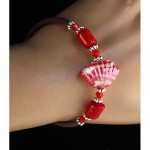 Браслет на струнке "ракушка" из коралла и муранского стекла Браслет на струнке "ракушка" из коралла и муранского стекла