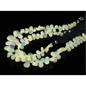 Бусины из опала капля на увеличение 20см, 63 бусины