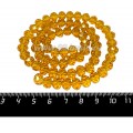Бусина хрустальная на нитке 8*6 мм янтарный около 40 см/нить