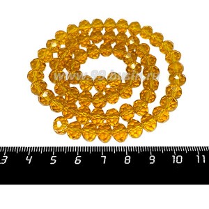 Бусина хрустальная на нитке 8*6 мм янтарный около 40 см/нить