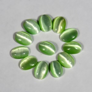 Кабошон кошачий глаз(иск.) овал зеленый, 5*7*2мм, уп. 100шт.