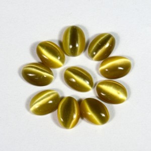 Кабошон кошачий глаз(иск.) овал оливковый, 5*7*3мм, уп. 100шт.