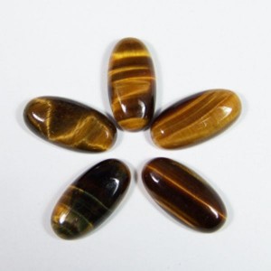 Кабошон из тигрового глаза овал, 12*24*5мм. Кабошон из тигрового глаза овал, 12*24*5мм.