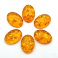 Кабошон из янтаря искусственного 13*17*5мм, коньячный