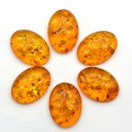 Кабошон из янтаря искусственного 15*20*6мм, коньячный