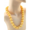 Бусы из янтаря шарик 18мм молочно-медовый, 56см