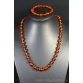 Набор из янтаря бусы и браслет мятый шарик 11-12мм коньячный, 55см