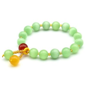 Браслет из кошачьего глаза (синт.) шарик 10мм цвет зелный светлый Браслет из кошачьего глаза (синт.) шарик 10мм цвет зелный светлый