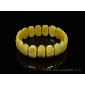 Браслет из янтаря сегмент 17*9мм карамельно-молочный.