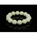 Браслет из янтаря шарик 15мм цвет "белоснежка"