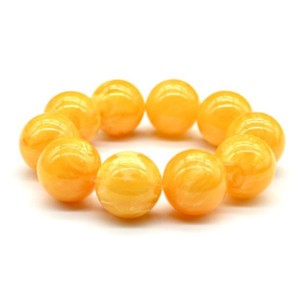 Браслет из янтаря шарик 20мм медово-молочный