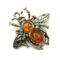 Брошь с янтарем в металле "Оса" 43*40мм коньячный (иск.)