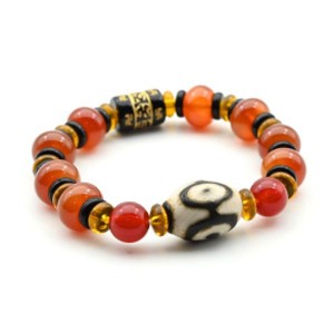 Браслет с бусиной дзи "Три глаза" бочонок 15*20мм с сердоликом рондель 12*8мм Браслет с бусиной дзи "Три глаза" бочонок 15*20мм с сердоликом рондель 12*8мм