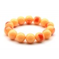 Браслет из полимера шарик 16мм цвет персиковый (иск.)