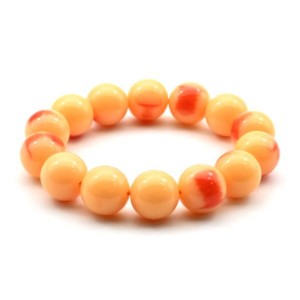 Браслет из полимера шарик 16мм цвет персиковый (иск.)