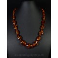 Колье из янтаря галтовка 15*20мм-20*33мм коньячный, 53см (иск.)