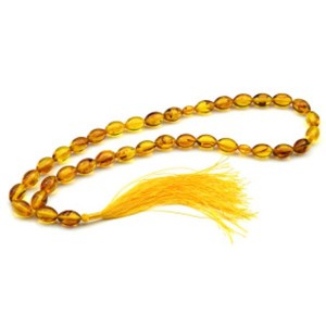 Четки мусульманские из янтаря овал 9*13мм цвет  медовый, 45см, 33 бусины (иск.)