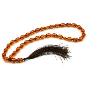 Четки мусульманские из янтаря овал 9*13мм цвет  коньячный, 45см, 33 бусины (иск.)