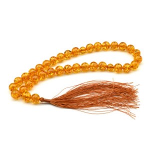 Четки мусульманские из янтаря шарик 10мм цвет  медовый, 35см (иск.)