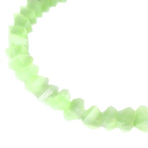 Бусины хрустальные Многогранник 5*4 мм полупроз. Светло-зеленый опал. около 34 см нить /около 90 бусин