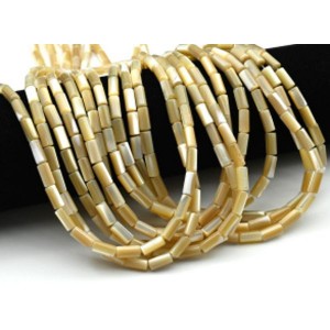 Бусины из перламутра цилиндр 5*10мм цв.кремовый, 40см, 39 бусин