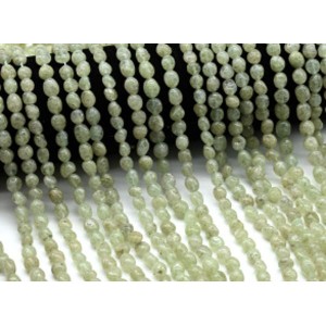 Бусины из кварца (празем) галтовка 6*8мм, 38см, 50 бусин