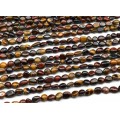 Бусины из бычьего, тигрового, соколиного глаза галтовка 5*8мм, 39см, 47 бусин Бусины из бычьего, тигрового, соколиного глаза галтовка 5*8мм, 39см, 47 бусин