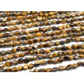 Бусины из тигрового глаза галтовка 5*8мм, 38см, 48 бусин
