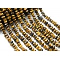 Бусины из тигрового глаза галтовка с гранями 10*7мм, 39см, 56 бусин.