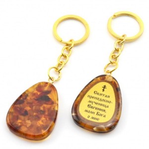 Брелок из янтаря с молитвой к Святой преподобно-мученице Евгении 30*40мм Брелок из янтаря с молитвой к Святой преподобно-мученице Евгении 30*40мм