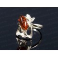 Кольцо с янтарём в посеребрении каприз коньячный (иск.)