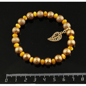 Браслет перламутр тонир. желтый (рондель), акрил (шарик 8мм), с подвеской