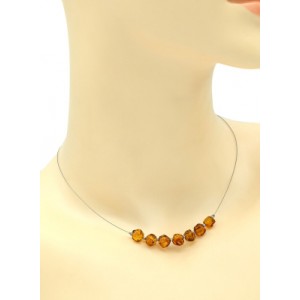 Бусы с янтарем на струне "кусанка" 7мм цвет коньячный, 40см Бусы с янтарем на струне "кусанка" 7мм цвет коньячный, 40см