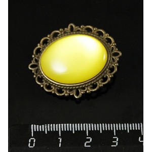 Брошь пластик желтый (эффект опала), с ажурным контуром, цвет бронза, овал 25х18мм