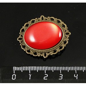 Брошь пластик красный (эффект опала), с ажурным контуром, цвет бронза, овал 25х18мм