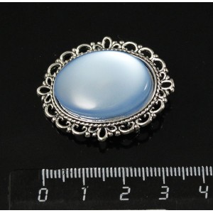 Брошь пластик голубой (эффект опала), с ажурным контуром, цвет ант. серебро, овал 25х18мм