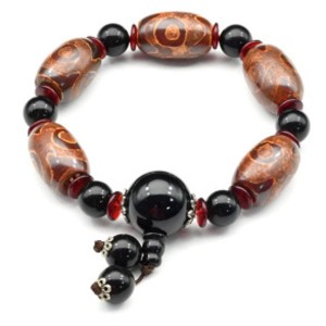 Браслет для мужчин Три глаза овал 14*23мм цвет рыжий, 18см