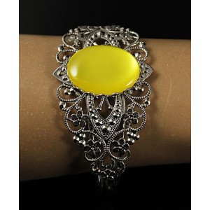 Браслет пластик желтый (эффект опала), овал 25х18мм, жесткая основа, цвет ант.серебро